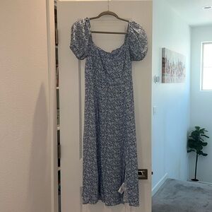 Floral blue dress. Off the shoulder look with a slit on the side